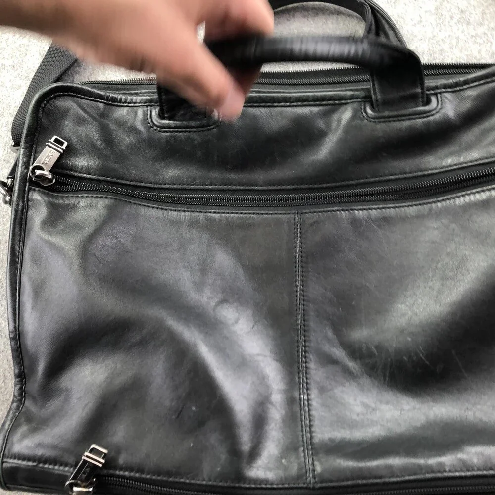 Tumi black leather